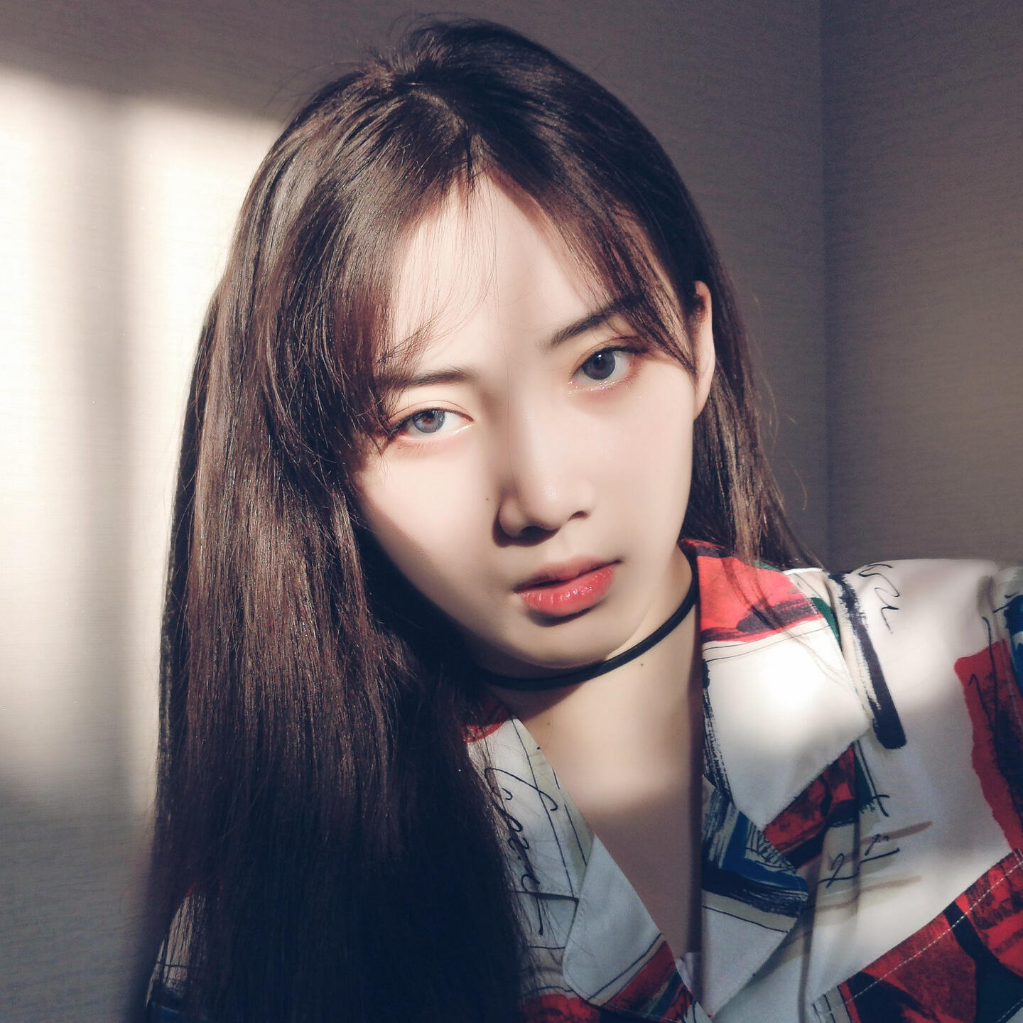 su ruiqi wearing face mask holding a yogurt drink bottle